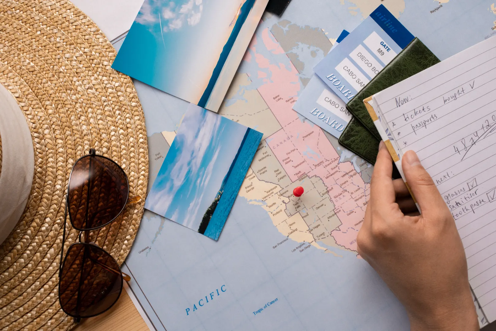 Travel planning items arranged on a table
